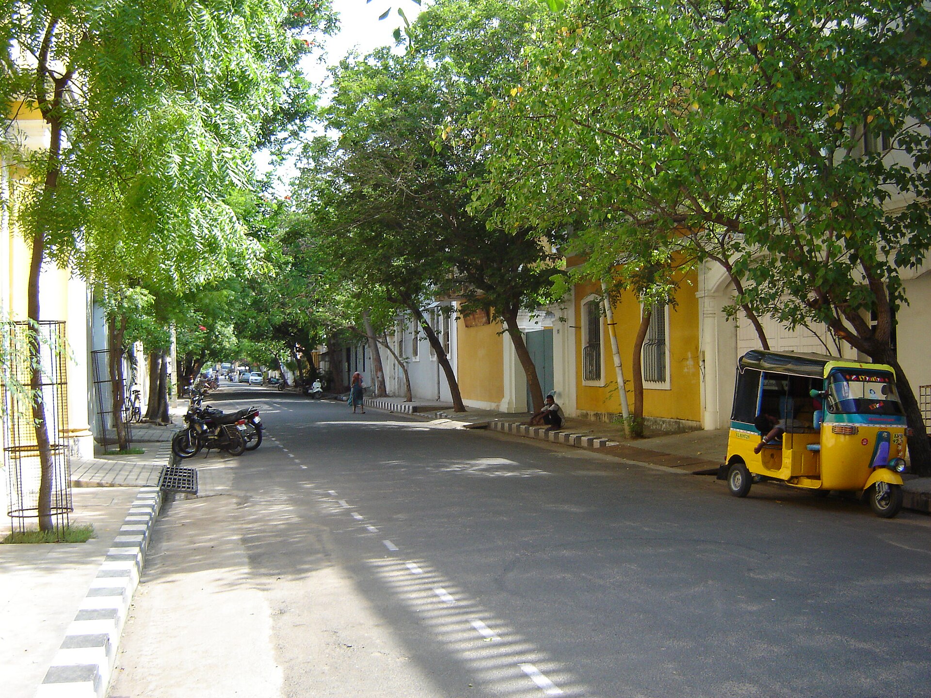 A quiet yellow-walled street in White Town, the French Quarter of Puducherry